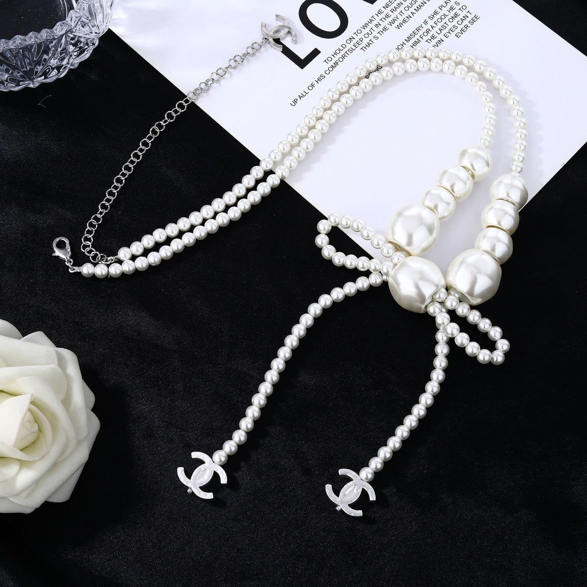 CHANEL 25S CHAIN BELT IN WHITE PEARL WITH BOW 614475